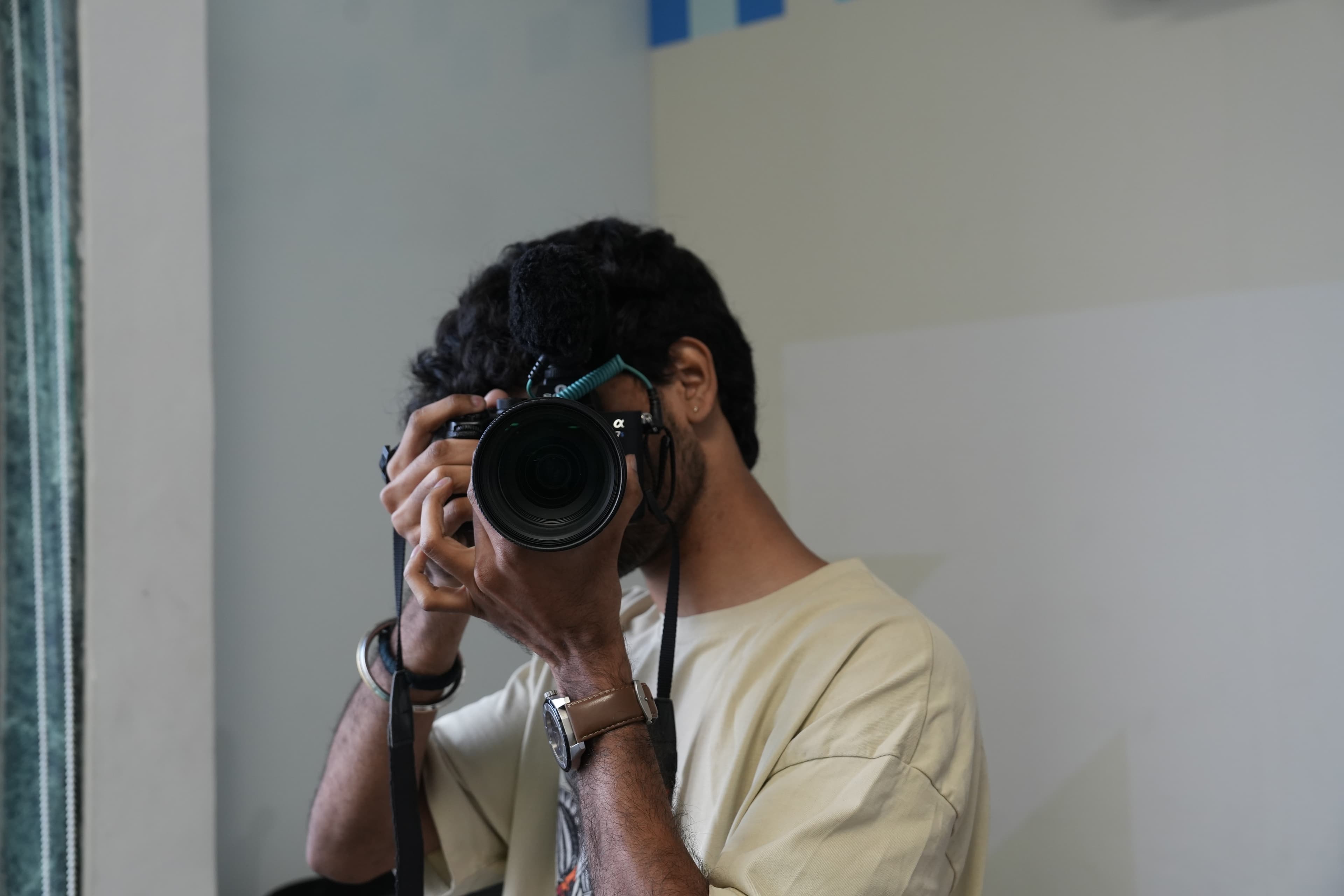 Rithwik shooting on a stills camera